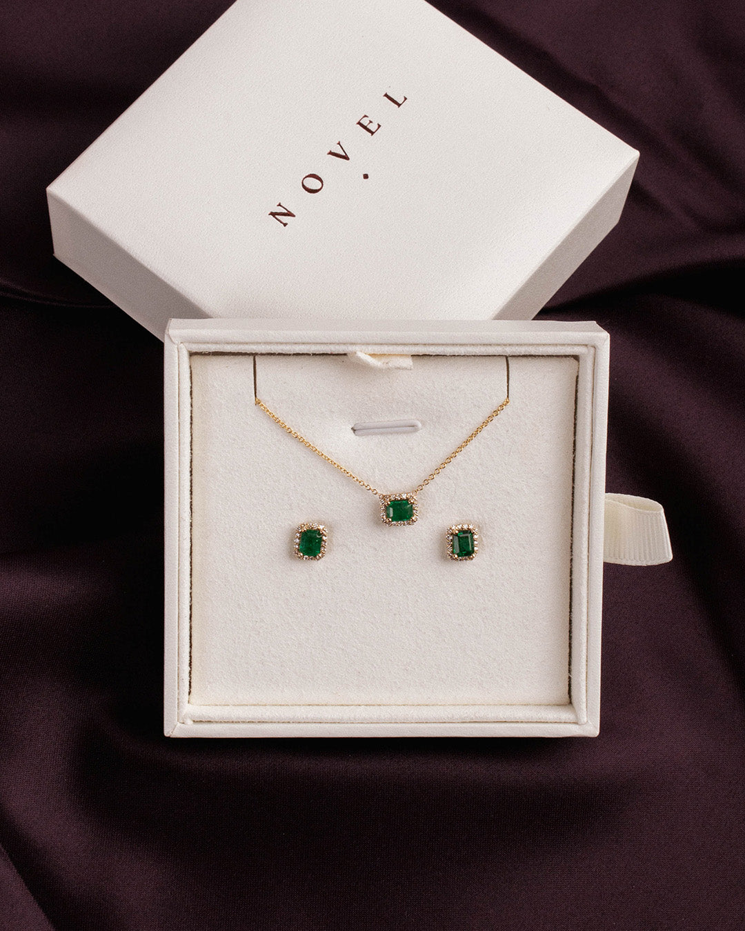 Emerald and diamond halo studs 2