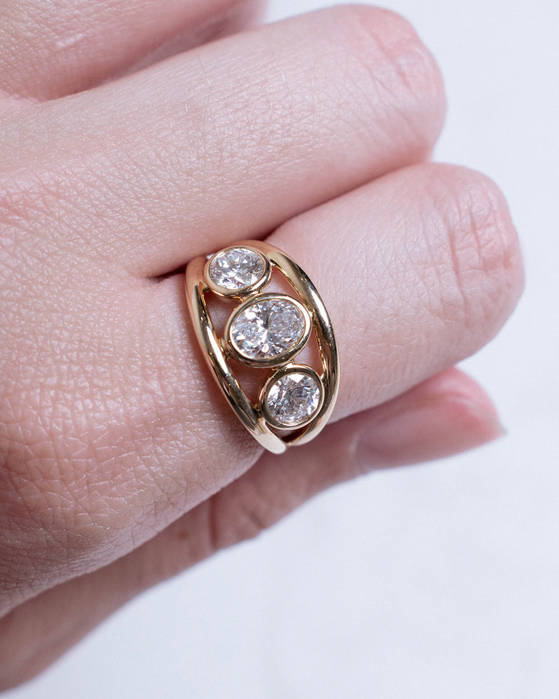 THREE OVAL BEZEL DIAMOND RING